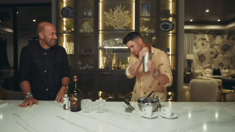Nick Jonas and John  Varvatos mixing up a Simply Chocolate Cocktail with Villa One tequila