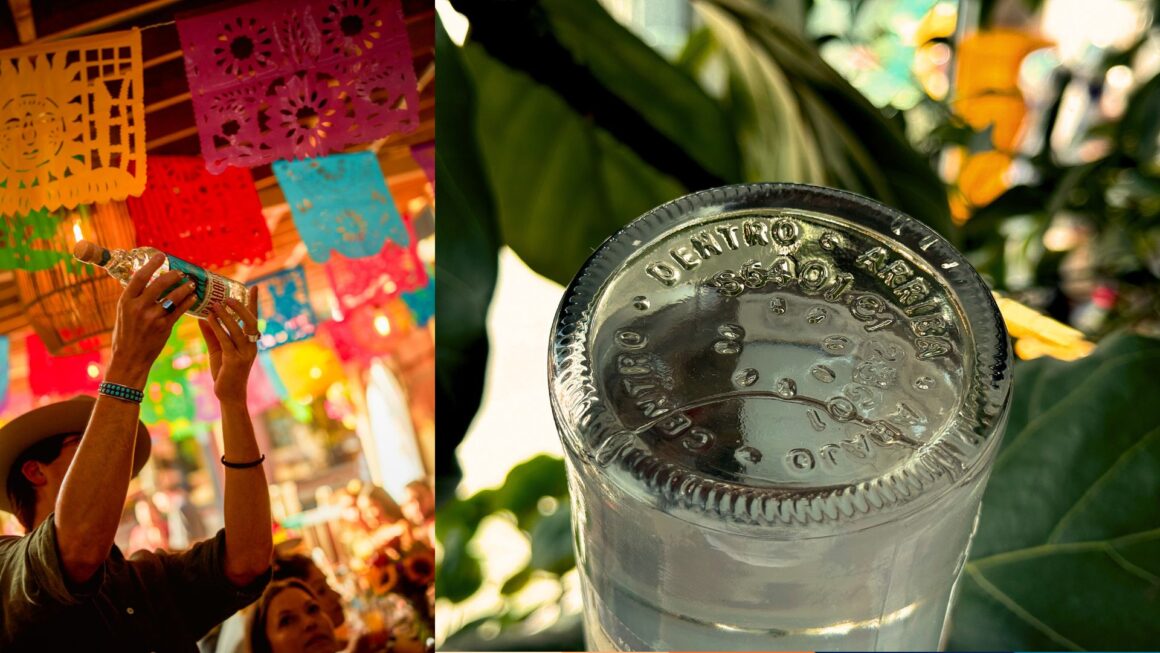 North American Brand Ambassador, Alan Ruesga-Pelayo raises a bottle of Tequila CAZADORES (left) to show off the inscription found on the bottom that shows the “ARRIVA. ABAJO. CENTRO. DENTRO.” A close up of the bottom of a bottle (right).   (Photo: Shane D’Costa / STAMINA Group)