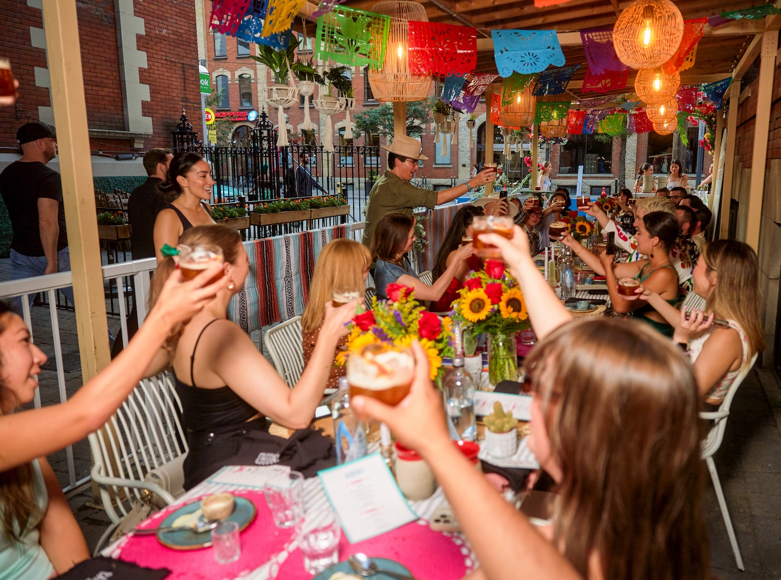 Guests are seen raising a toast at the end of the Tequila CAZADORES celebration dinner to end the night. (Photo: Shane D’Costa / STAMINA Group) 