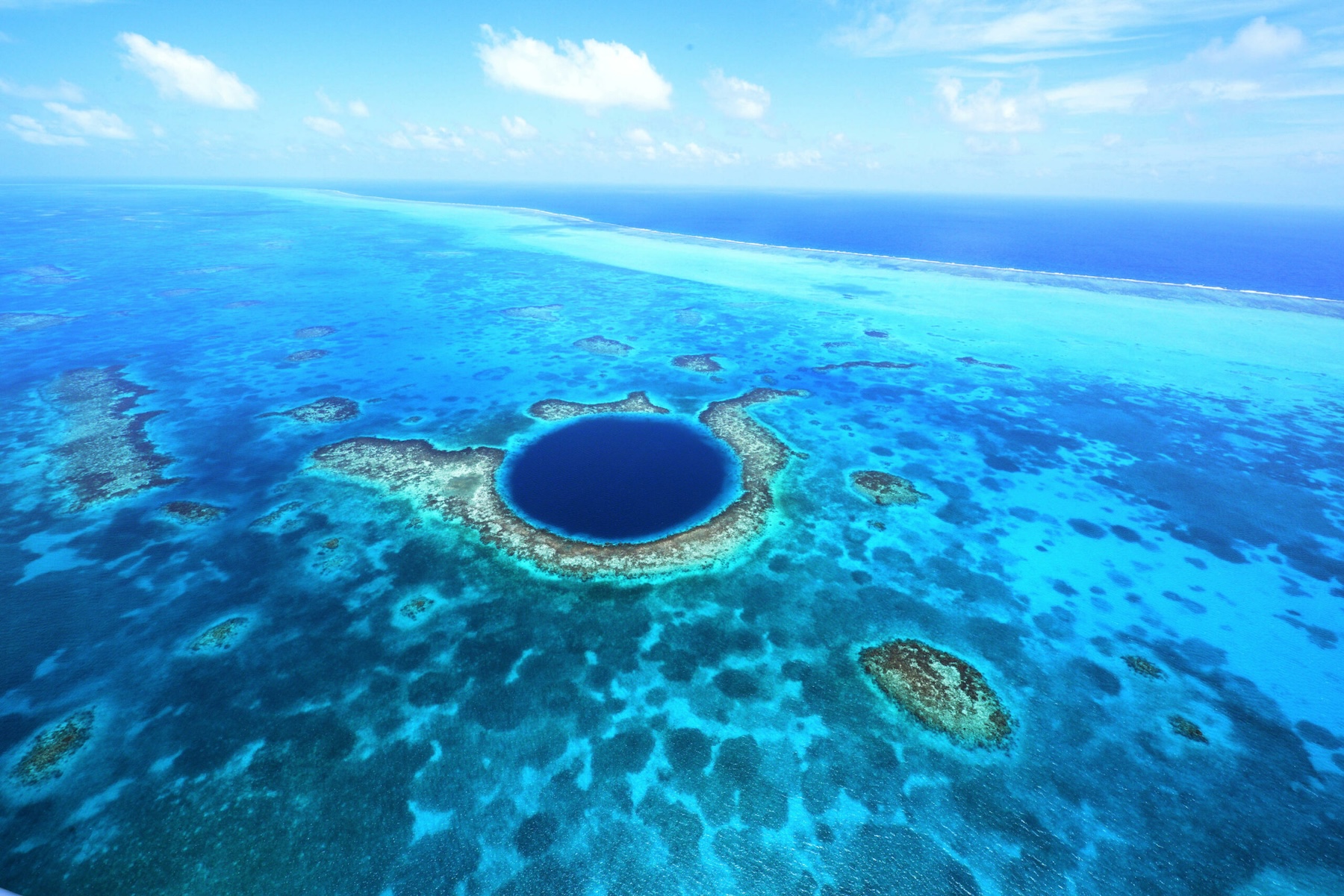 The Great Deep Blue Hole in the ocean near Belize Tourism the ultimate destination for divers a bucketlist for sure. 