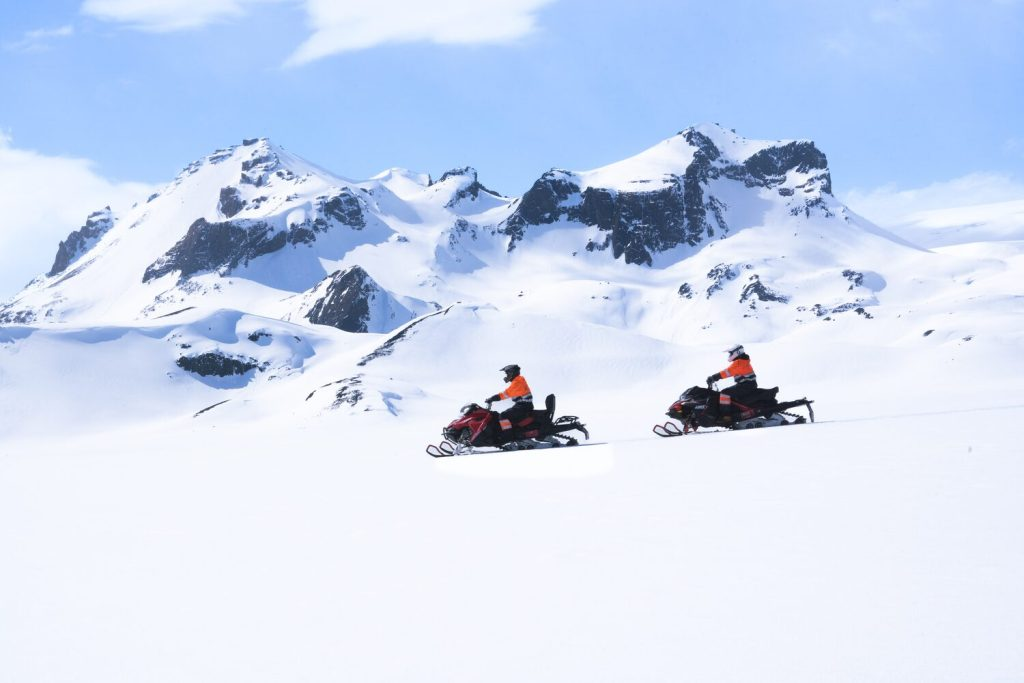 Snowmobiling in Golden Circle Iceland Snowmobile.is adventure excursion Play Airlines